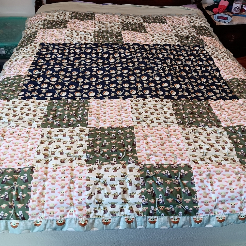 Baby Yoda Quilt with matching pillow.
